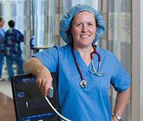 Photo of a smiling nurse. Links to What to Give