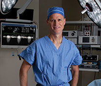 Photo of a surgeon in an operating room. Links to Gifts from Retirement Plans